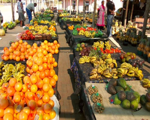 Close up of various organic fruits and vegetables at a local market